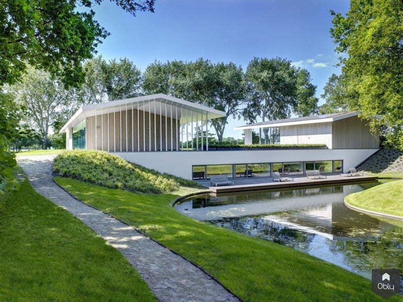 Waterdoorlatende tuin bij villa-Kamsteeg Tuinen-alle,Tuinen-OBLY