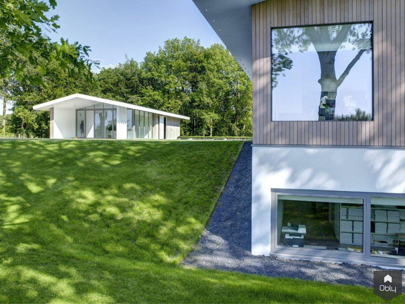 Waterdoorlatende tuin bij villa-Kamsteeg Tuinen-alle,Tuinen-OBLY