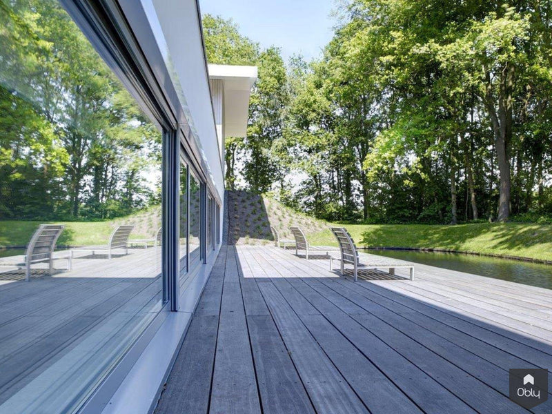 Waterdoorlatende tuin bij villa-Kamsteeg Tuinen-alle,Tuinen-OBLY