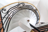 Wenteltrap met siersmeedwerk-Van Bruchem Staircases-alle,Entree hal trap-OBLY