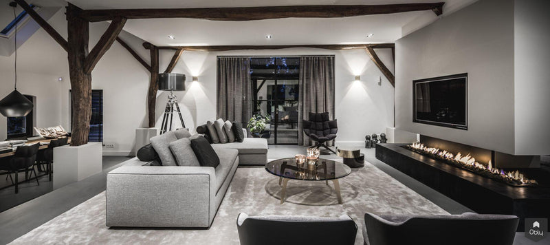 Woonkamer met vrijstaande haard in Villa-LTD Studio-alle,Woonkamer-OBLY