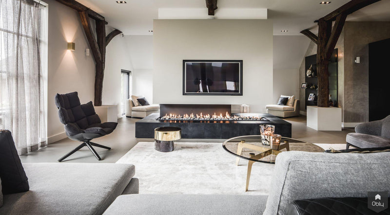 Woonkamer met vrijstaande haard in Villa-LTD Studio-alle,Woonkamer-OBLY