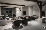Woonkamer met vrijstaande haard in Villa-LTD Studio-alle,Woonkamer-OBLY