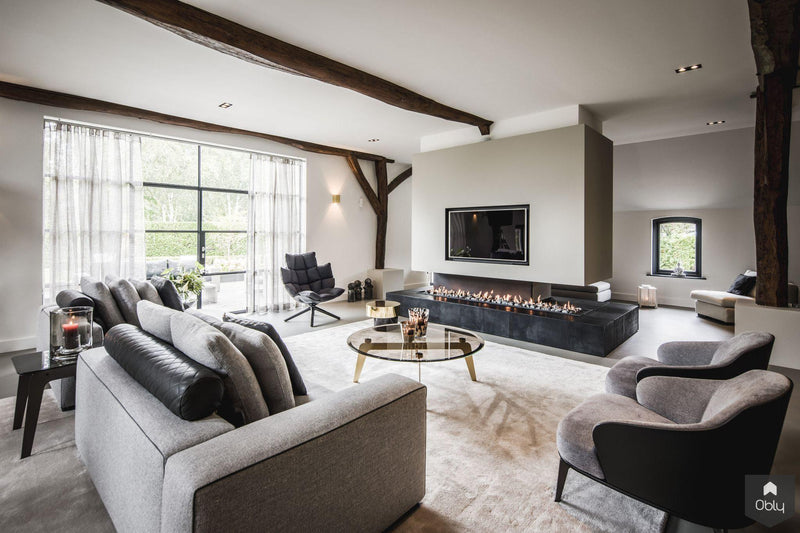 Woonkamer met vrijstaande haard in Villa-LTD Studio-alle,Woonkamer-OBLY