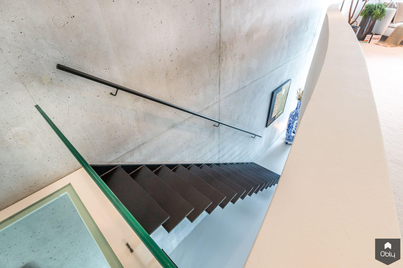 Zwevende stalen trap-Van Bruchem Staircases-alle,Entree hal trap-OBLY