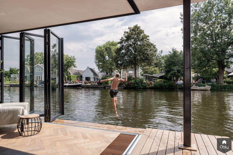 Glazen vouwwanden op een moderne woonboot-Solarlux Nederland BV-alle, Woonkamer-OBLY